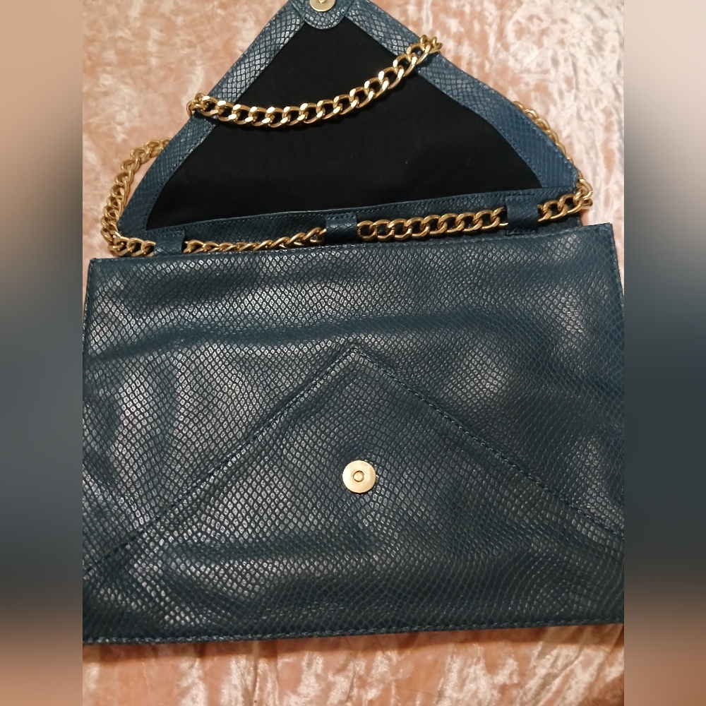 FREE WITH ANY PURCHASE.          Foley & Corinna bag/clutch
